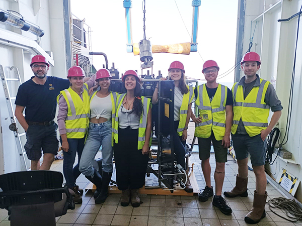 Group picture with part of the international science party on board. From left to right: Thierry Cariou (France), Anna Kolomijeca (Latvia), Maria de la Fuente Ruiz (Spain), Vanessa Romero-Kutzner (Spain), Jessica Newman (UK), Lukas Marx (Germany) and Thomas Wilder (UK)