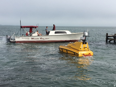 The C-Worker 4 with its support vessel in Belize City.