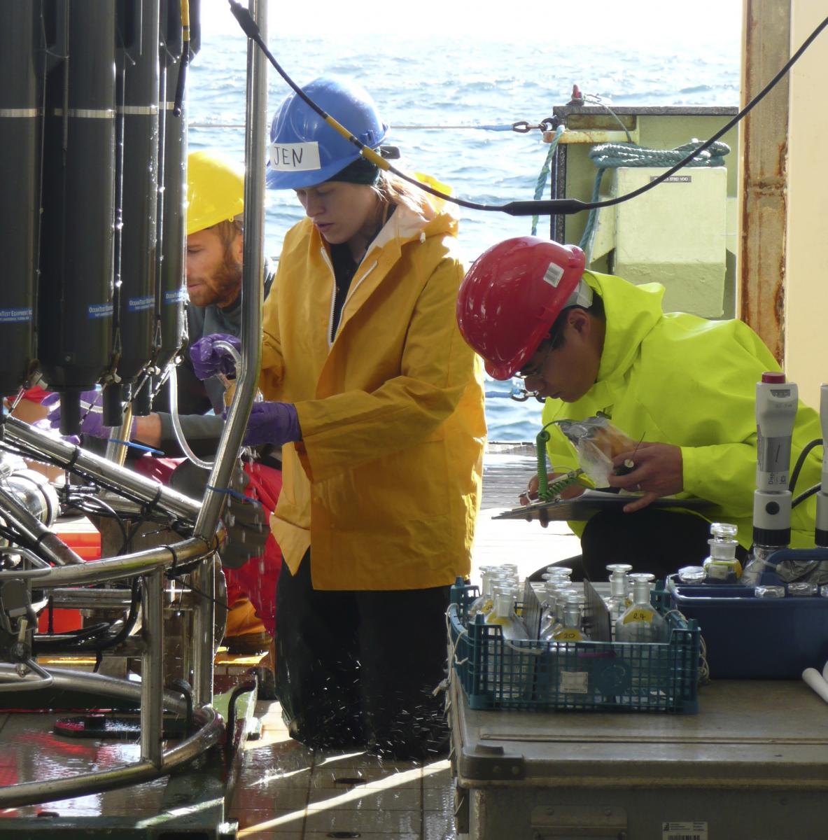 Scientists collecting water samples.